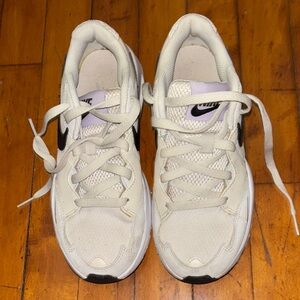 Nike Women’s White Sneakers with Black Swoosh and Light Purple Tongue